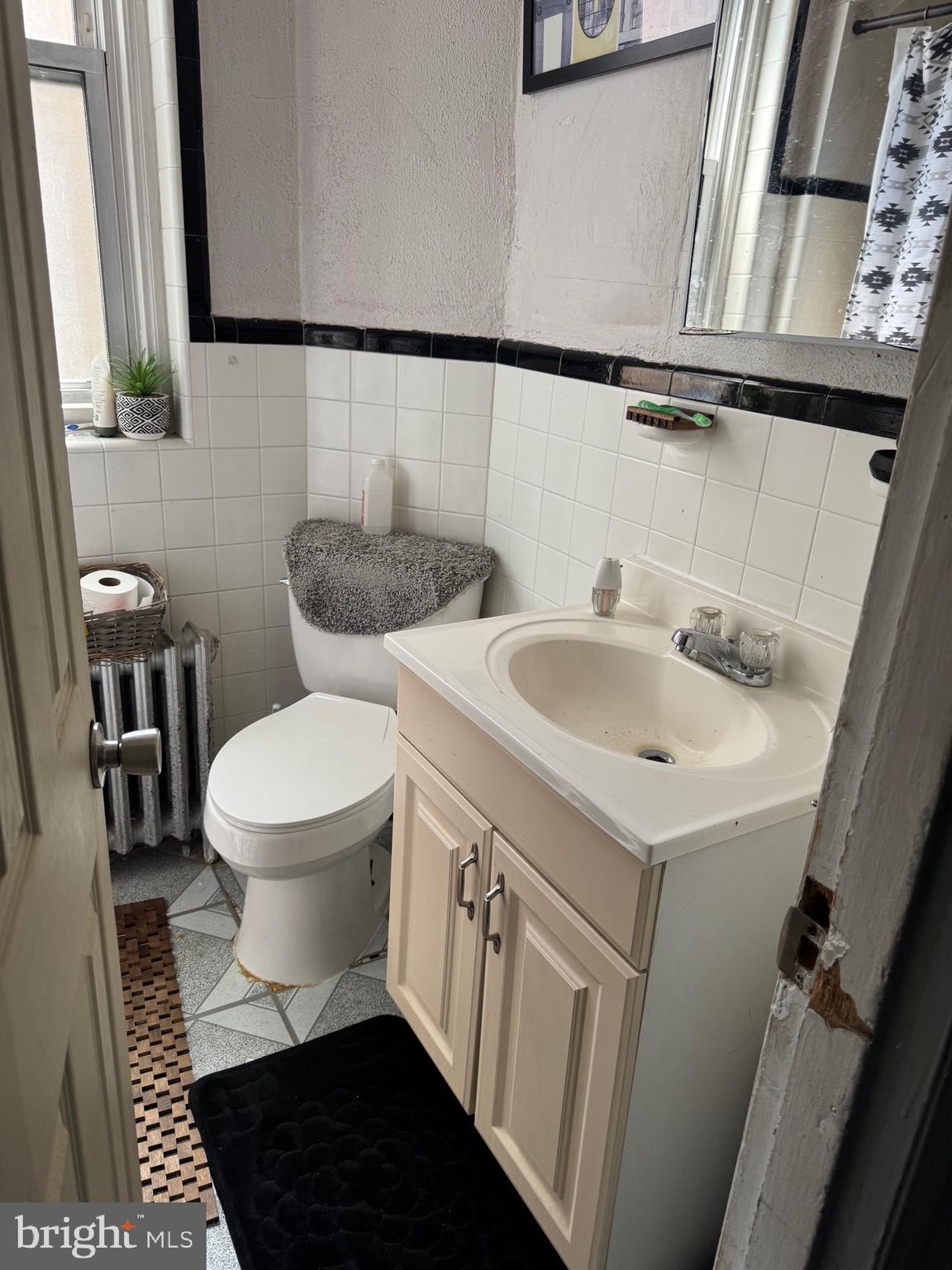 5634 Morton Street Philadelphia, PA 19144 - Photo 8 of 43 a bathroom with a sink and a toilet