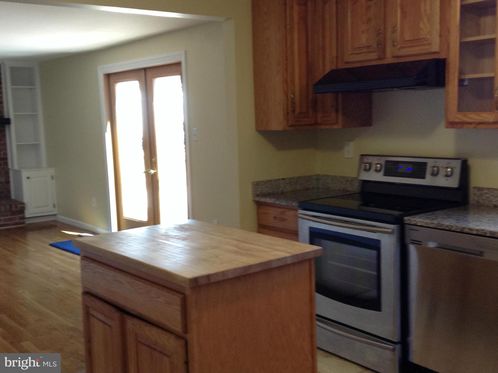 6117 Covered Bridge Road Burke, VA 22015 - Photo 12 of 30 Kitchen - view of family room french drs