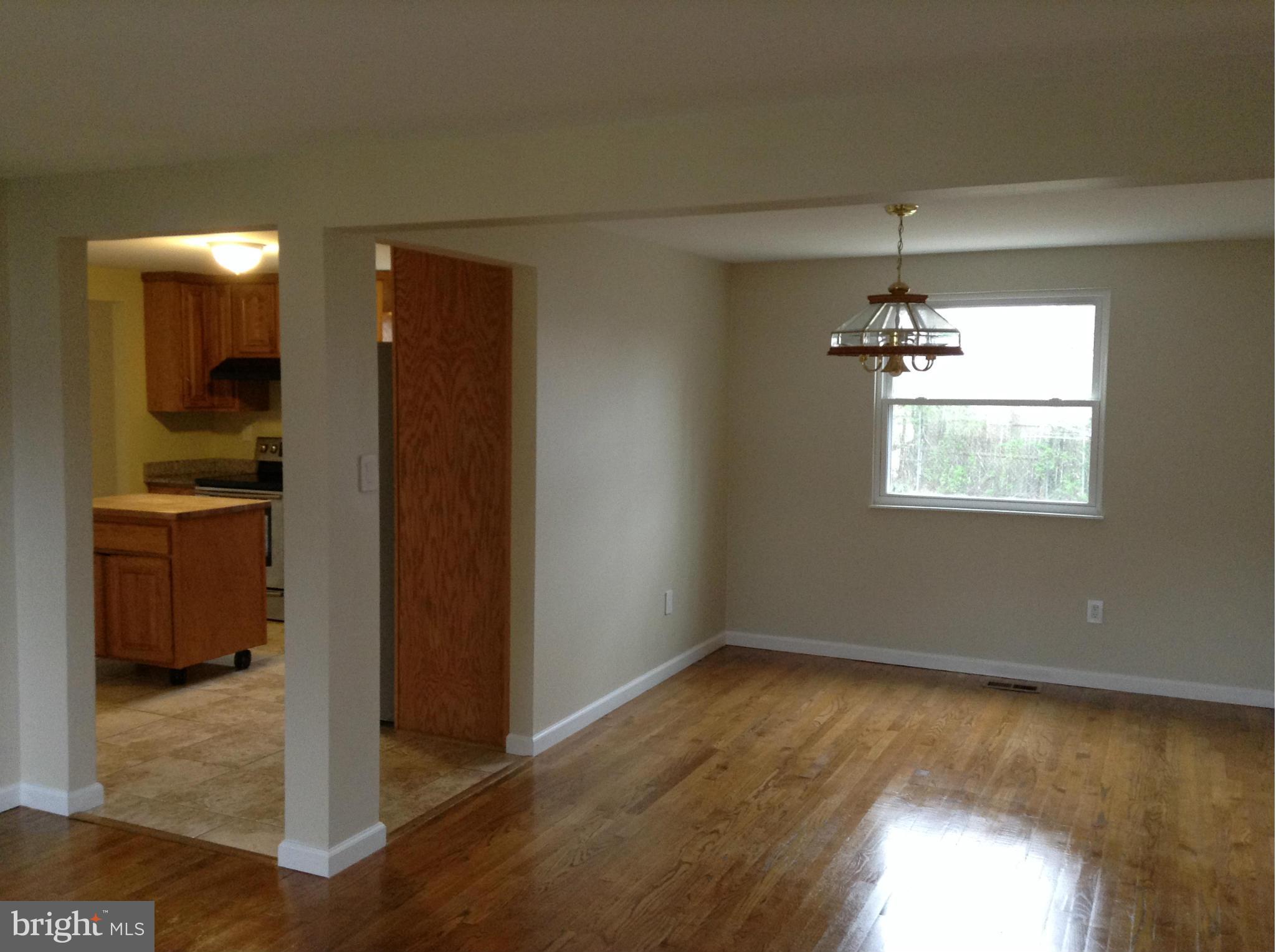 6117 Covered Bridge Road Burke, VA 22015 - Photo 18 of 30 Living Room - View of Dining Rm & Kitchen from it