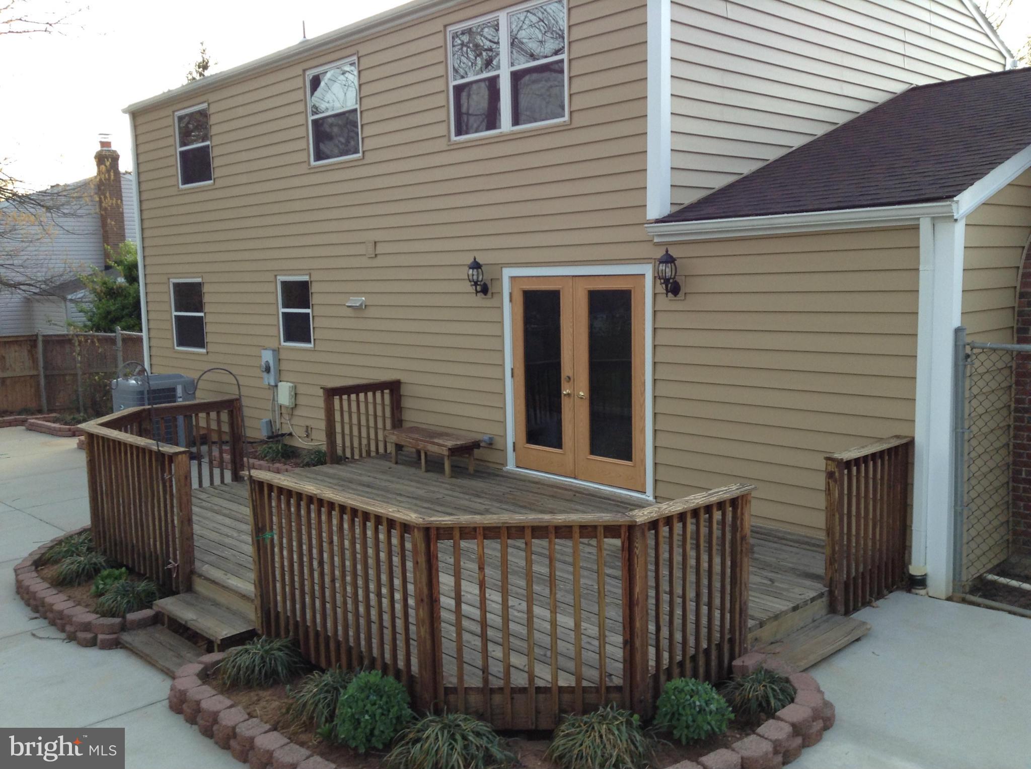 6117 Covered Bridge Road Burke, VA 22015 - Photo 8 of 30 Exterior (Rear) wood deck