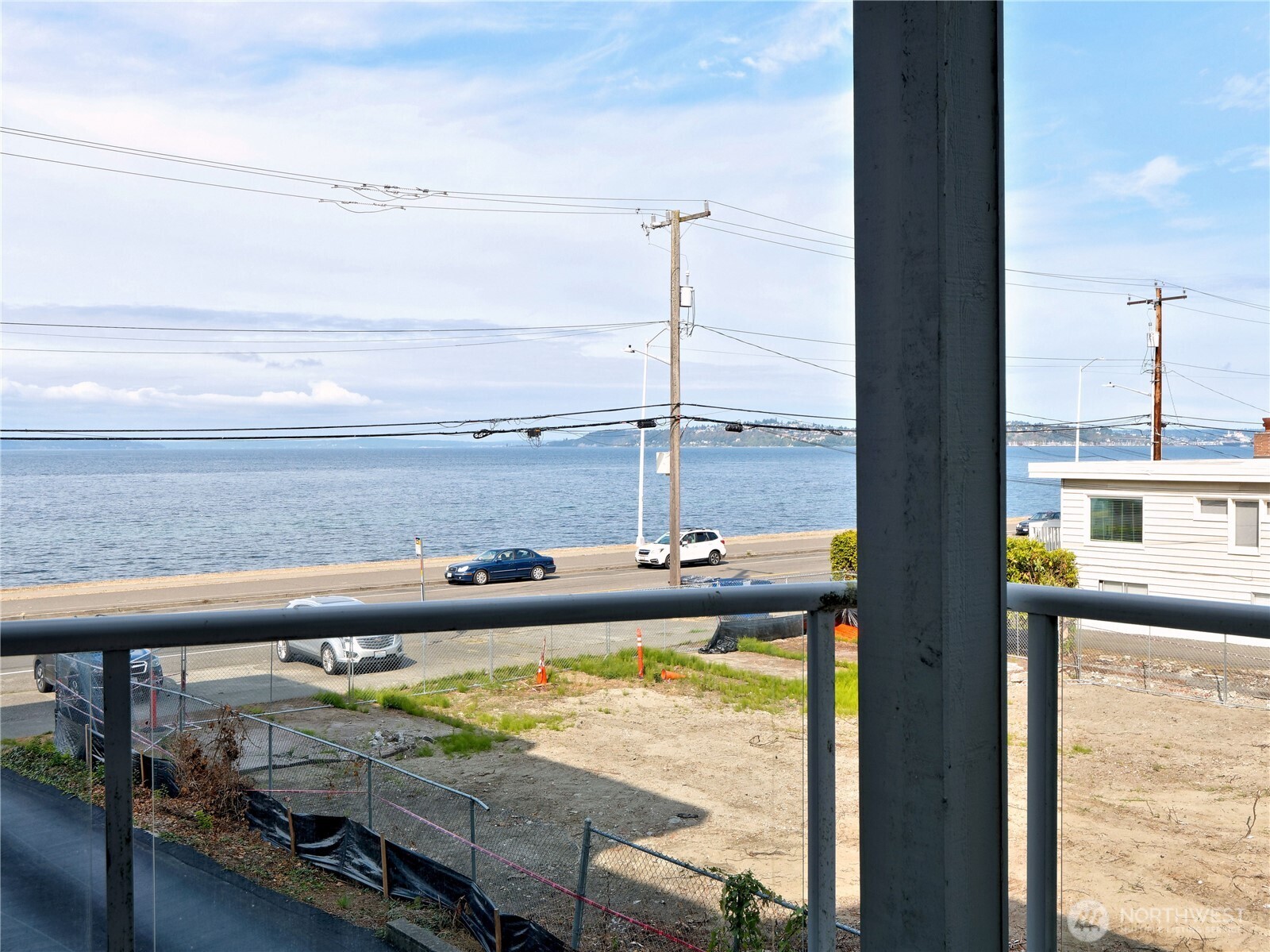 2104 Alki Avenue Southwest, Unit 205 Seattle, WA 98116 - Photo 13 of 39 a view of a ocean from a balcony