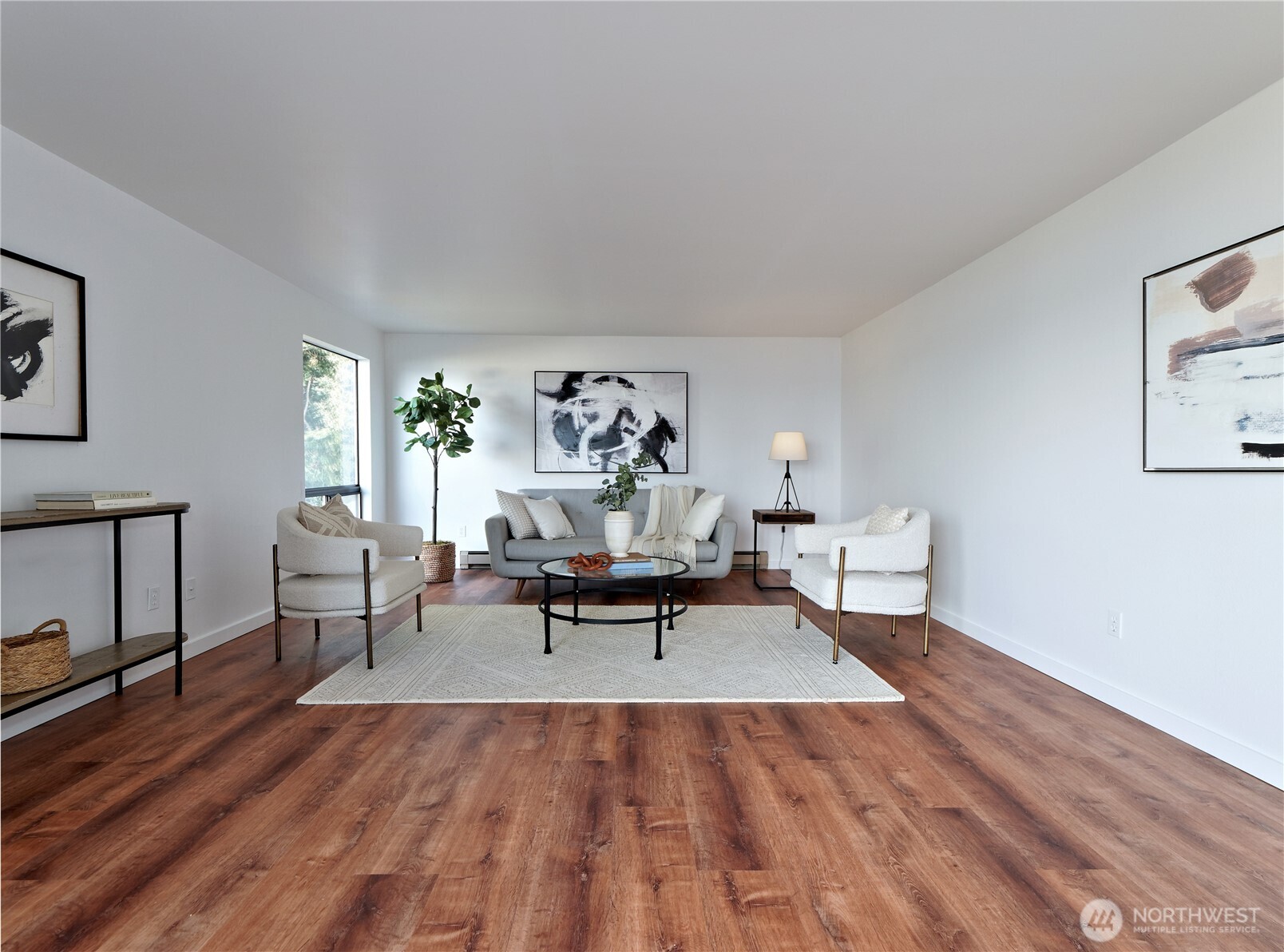 2104 Alki Avenue Southwest, Unit 205 Seattle, WA 98116 - Photo 18 of 39 a living room with furniture and a rug