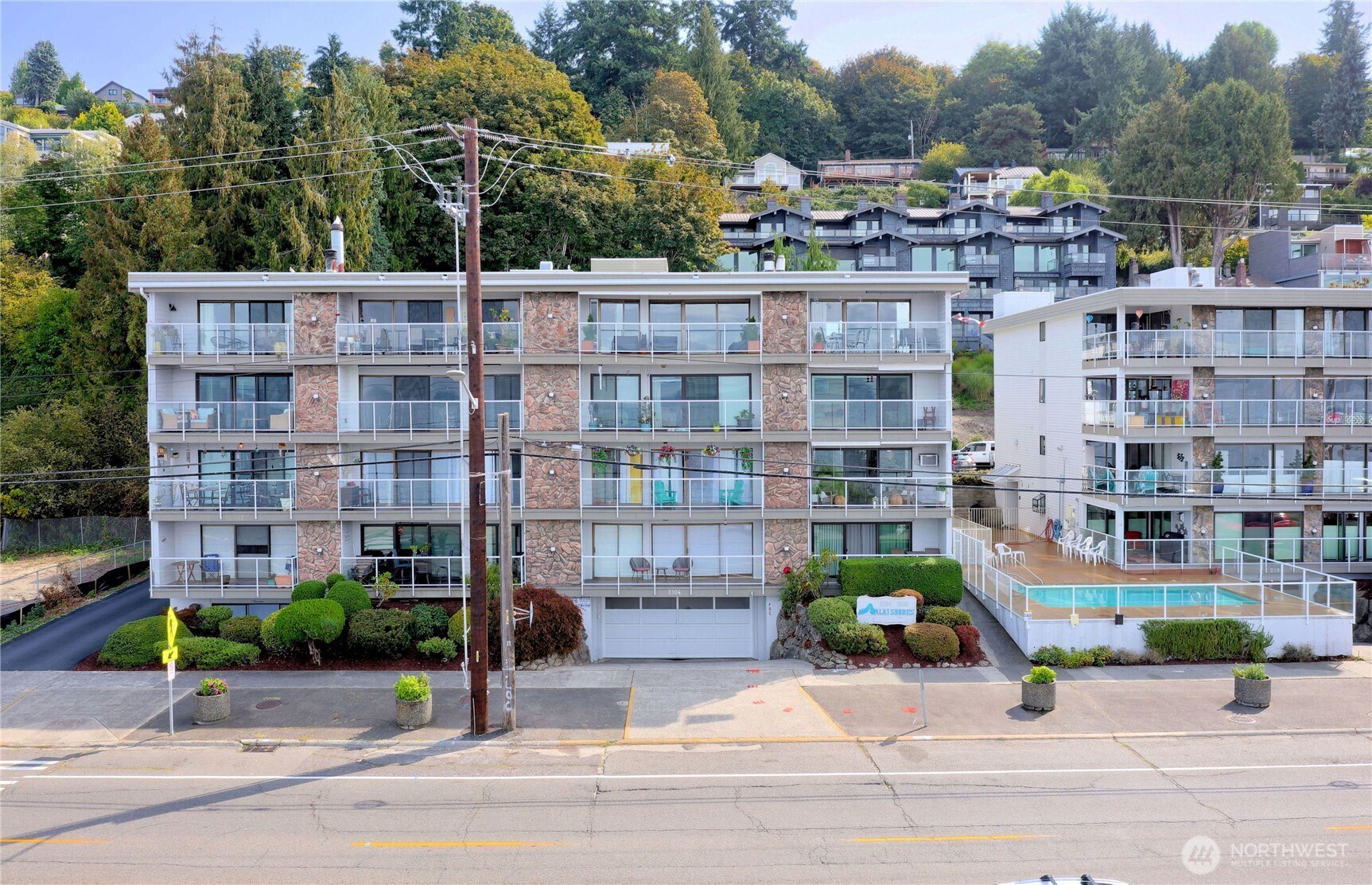 2104 Alki Avenue Southwest, Unit 205 Seattle, WA 98116 - Photo 2 of 39 a view of building with street view