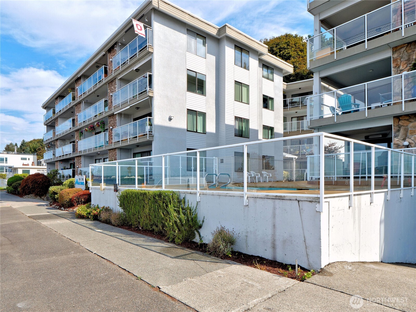 2104 Alki Avenue Southwest, Unit 205 Seattle, WA 98116 - Photo 31 of 39 a front view of a building with street view