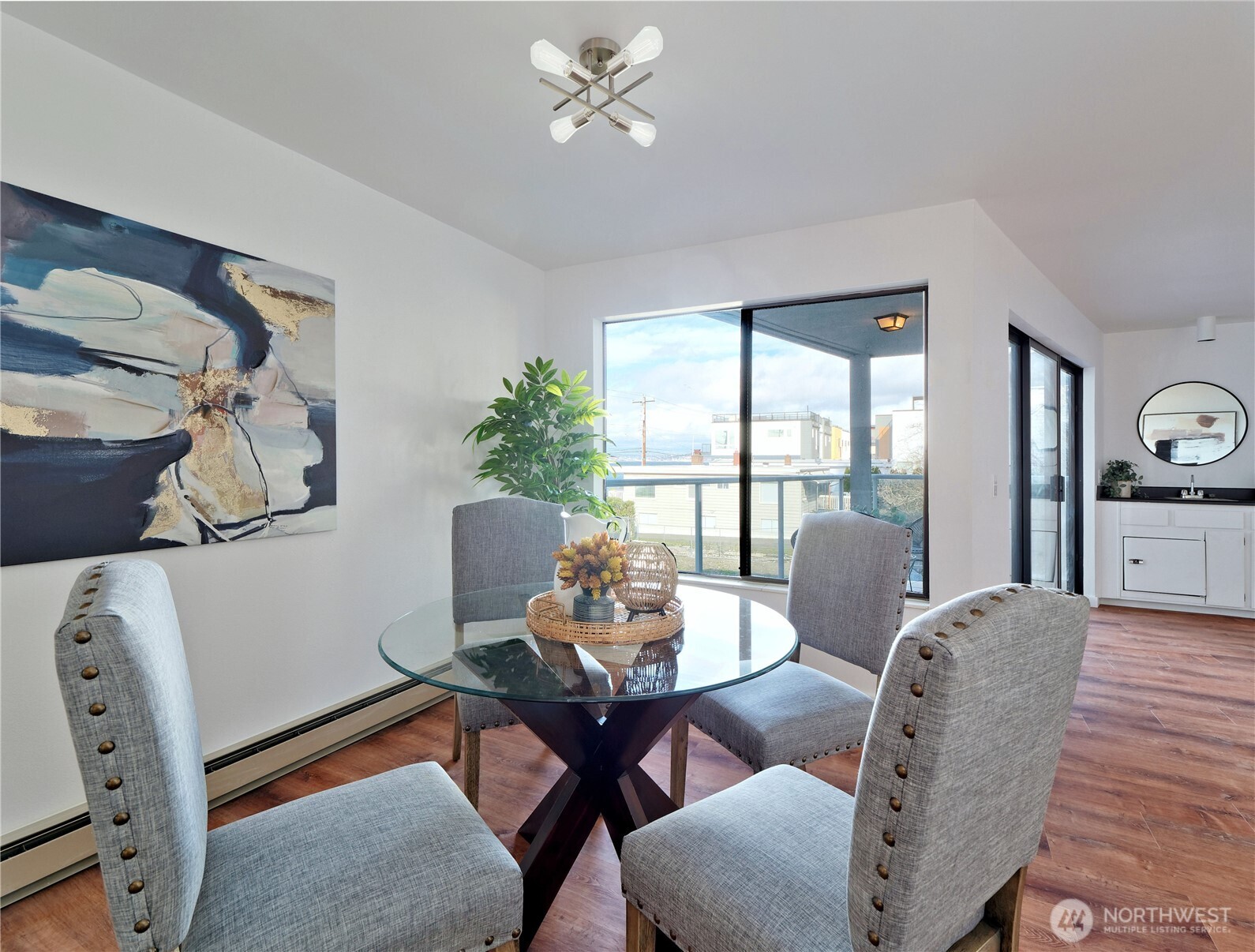 2104 Alki Avenue Southwest, Unit 205 Seattle, WA 98116 - Photo 9 of 39 a living room with furniture and wooden floor