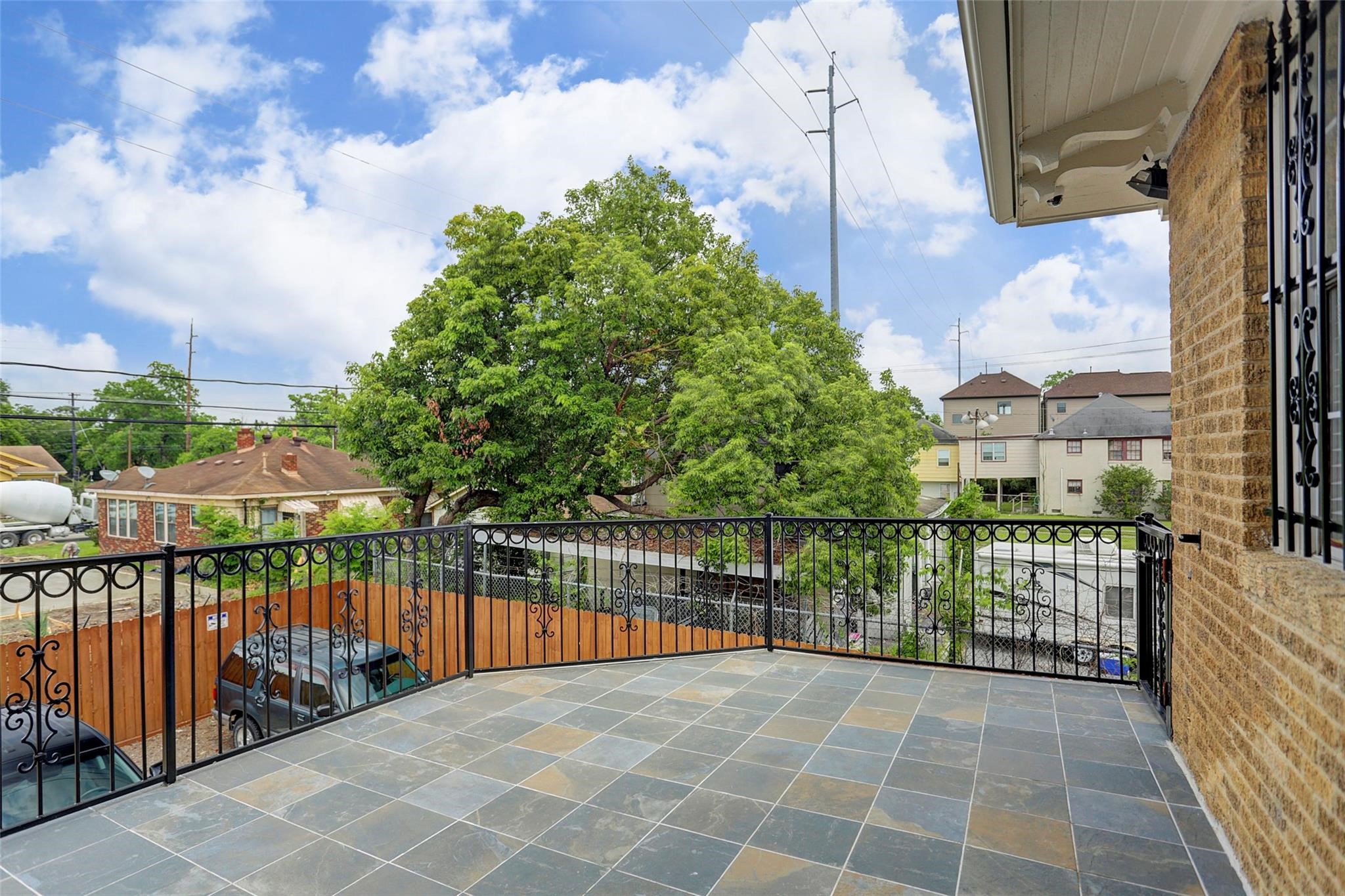 2709 Blodgett Street Houston, TX 77004 - Photo 20 of 27 a view of a balcony with wooden floor