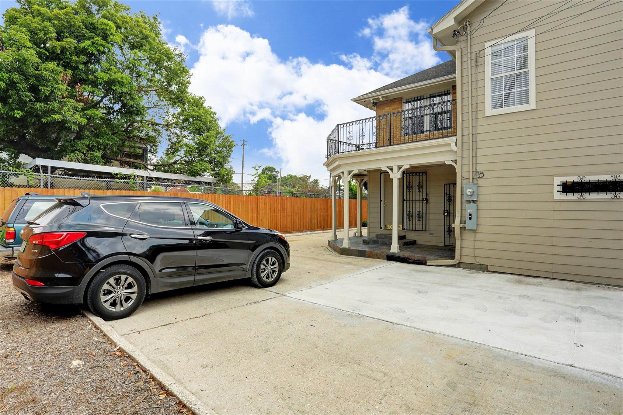 2709 Blodgett Street Houston, TX 77004 - Photo 21 of 27 a view of a car parked in a parking space