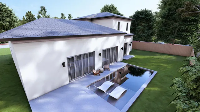 a view of house with backyard and outdoor seating