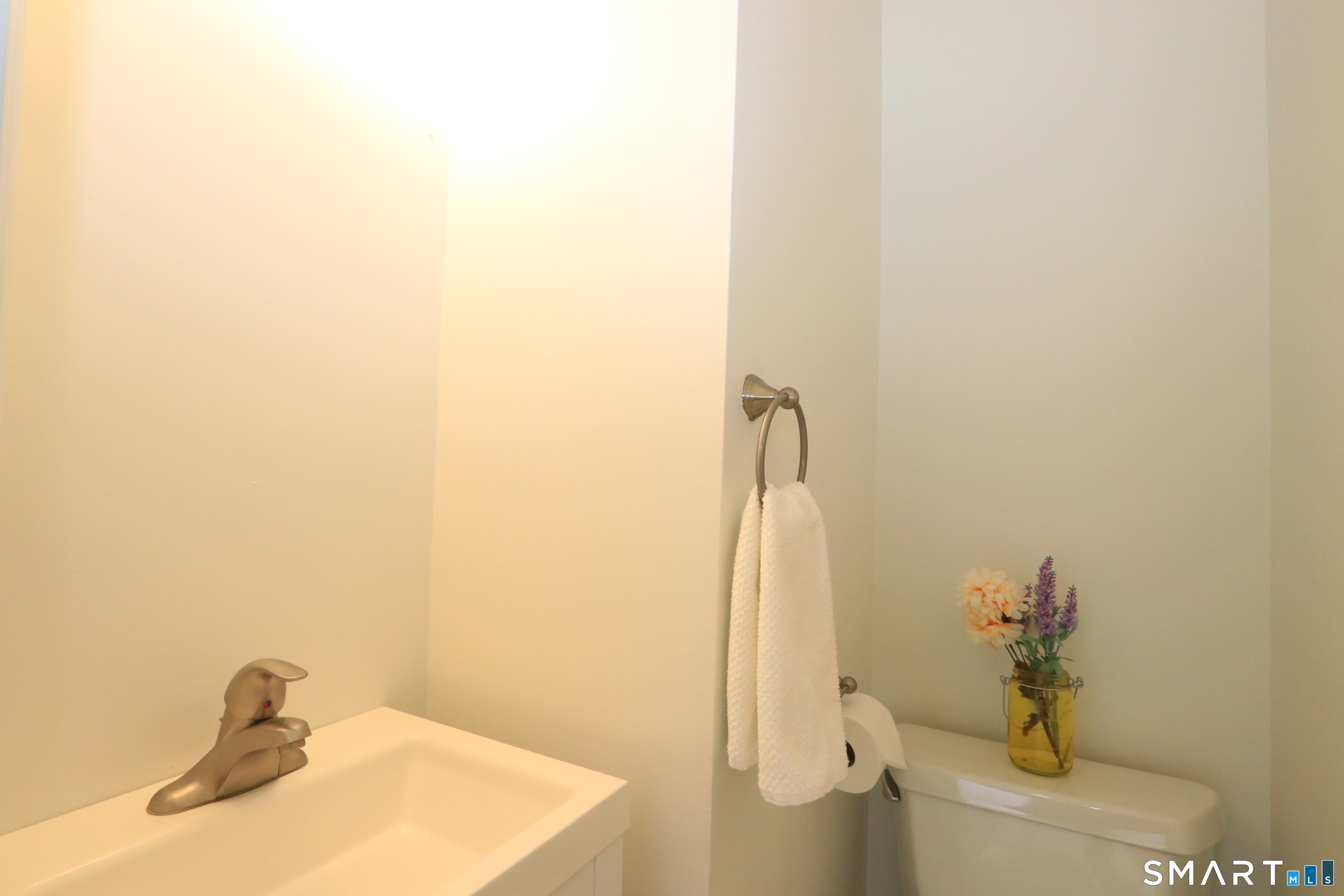 50 Wilton Crest Road, Unit 50 Wilton, CT 06897 - Photo 17 of 39 Half bath off entry hallway
