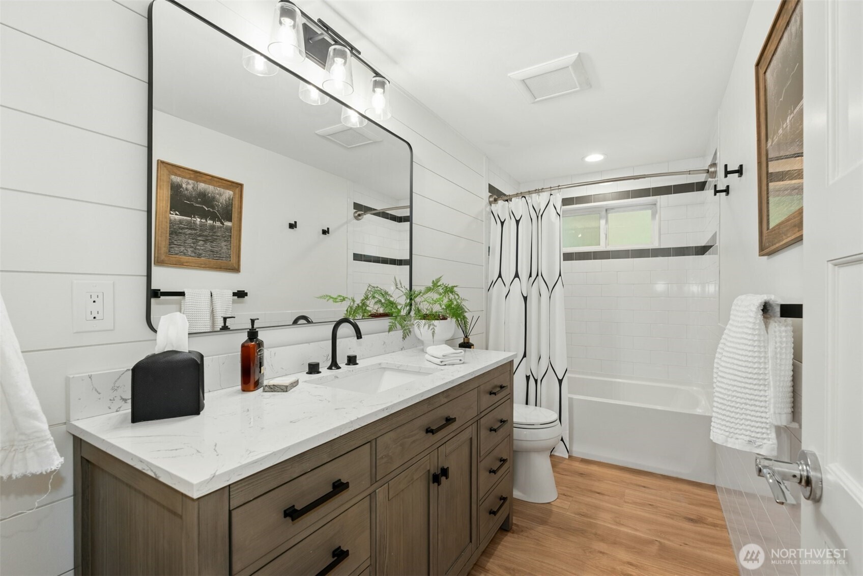 23307 49th Avenue Southeast Bothell, WA 98021 - Photo 20 of 37 a bathroom with a sink a toilet and shower