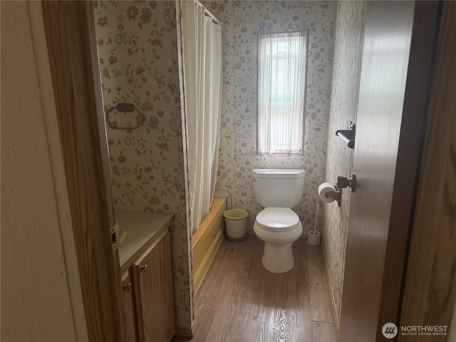 212 Old Owen Road, Unit 59 Sultan, WA 98294 - Photo 12 of 13 a bathroom with a toilet and a shower