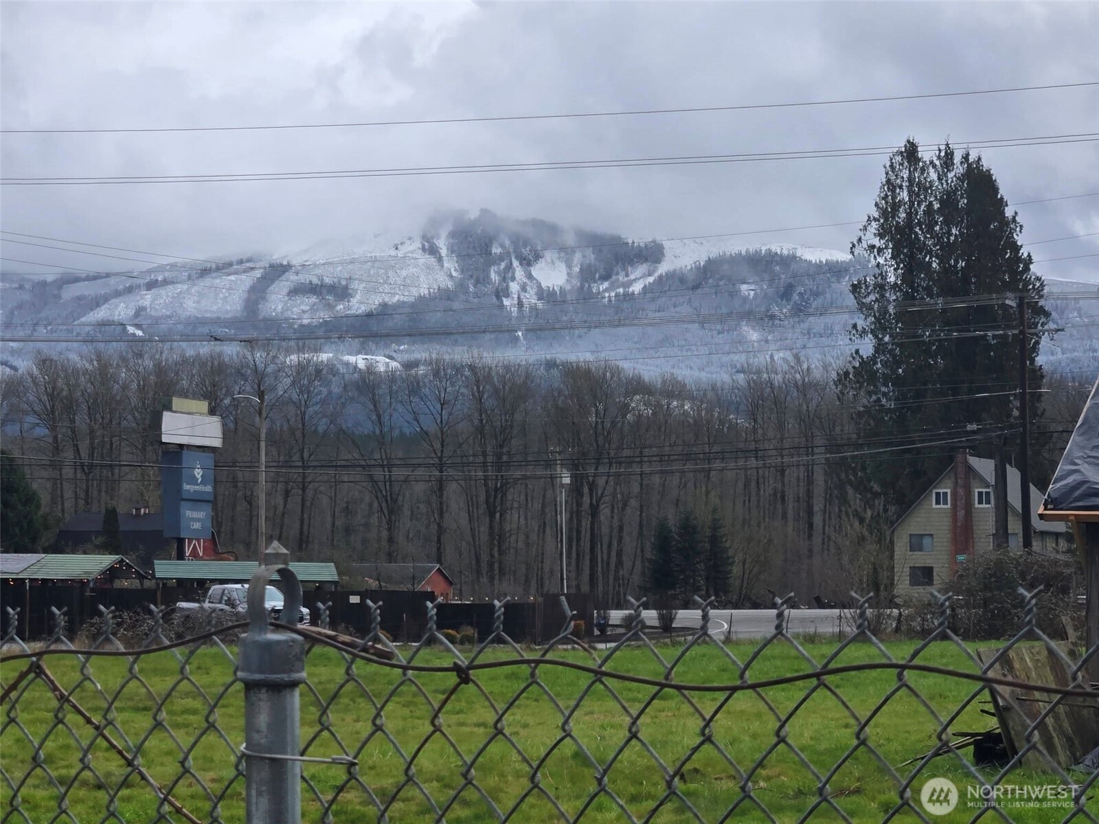 212 Old Owen Road, Unit 59 Sultan, WA 98294 - Photo 17 of 18 a balcony with table and chairs