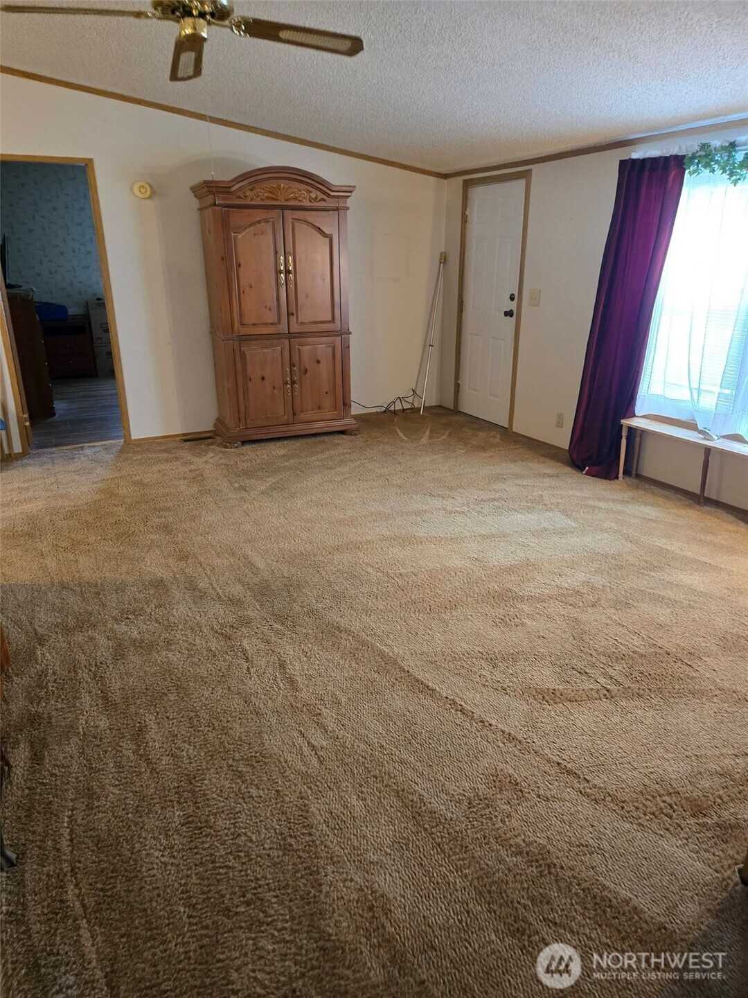 212 Old Owen Road, Unit 59 Sultan, WA 98294 - Photo 5 of 18 an empty room with windows