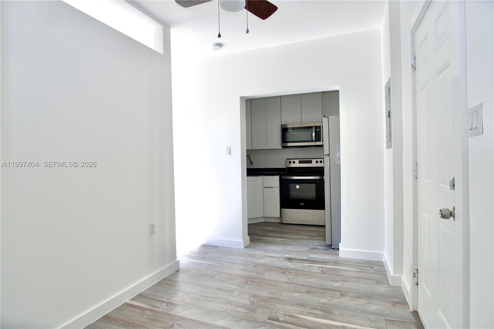 1036 Southwest 5th Street, Unit 12 Miami, FL 33130 - Photo 9 of 19 a view of a kitchen with a sink and dishwasher