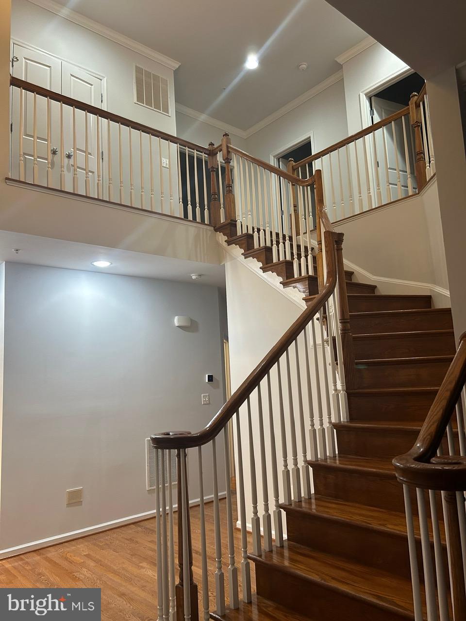 1101 Verbena Court Silver Spring, MD 20906 - Photo 16 of 36 a view of staircase with railing and white walls