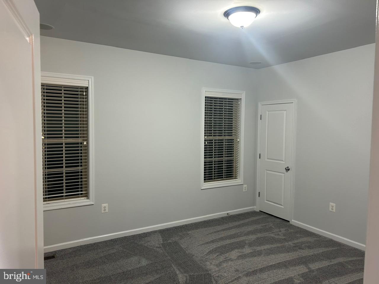 1101 Verbena Court Silver Spring, MD 20906 - Photo 22 of 36 a view of an empty room with a window