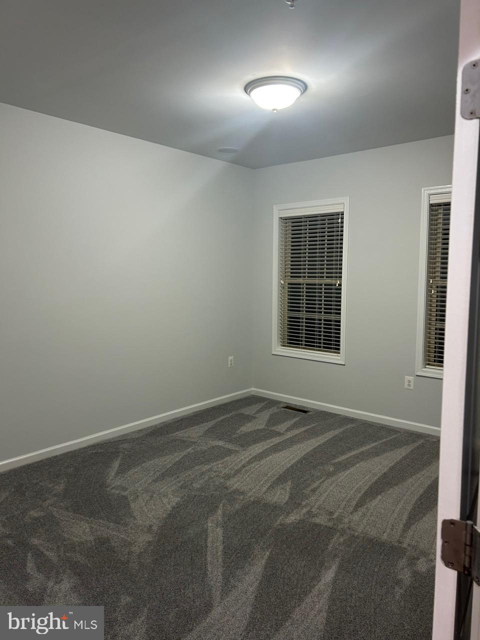 1101 Verbena Court Silver Spring, MD 20906 - Photo 26 of 36 an empty room with windows