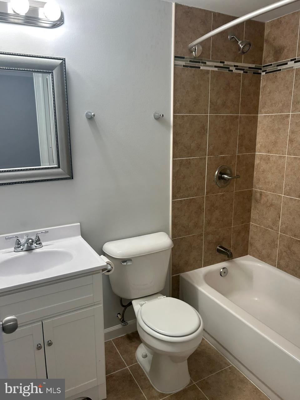 1101 Verbena Court Silver Spring, MD 20906 - Photo 31 of 36 a bathroom with a sink toilet and shower