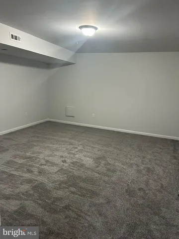 a view of storage and utility room