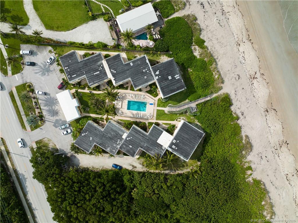 3541 Northeast Ocean Boulevard, Unit 14 Stuart, FL 34996 - Photo 13 of 15 an aerial view of residential houses with outdoor space