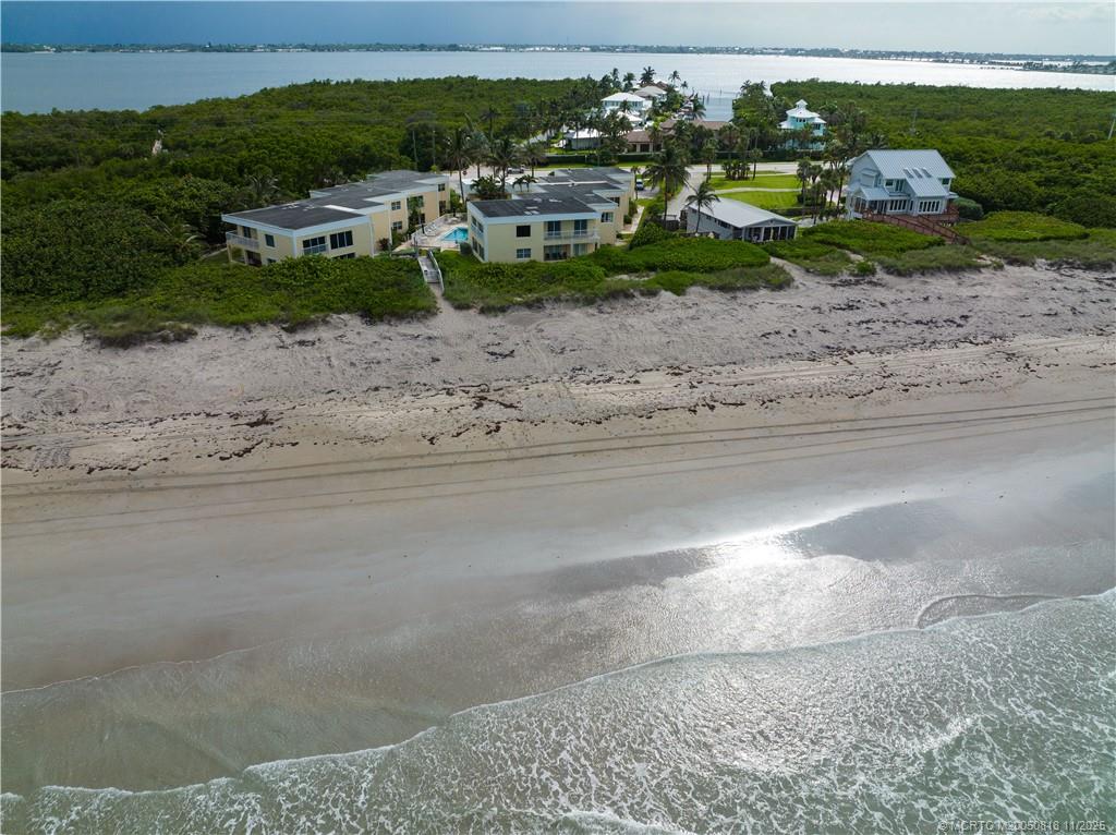 3541 Northeast Ocean Boulevard, Unit 14 Stuart, FL 34996 - Photo 15 of 15 a view of a road with a yard