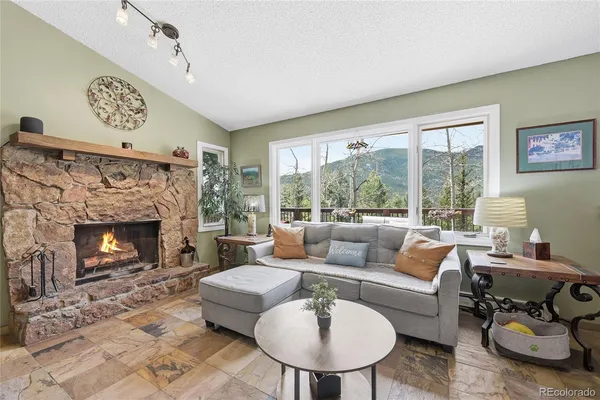 $720,000 | 70 Jackpine Lane, Evergreen, CO 80439