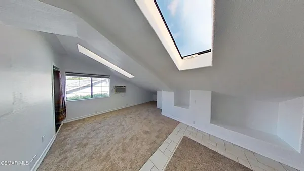 a kitchen with stainless steel appliances a sink stove and cabinets