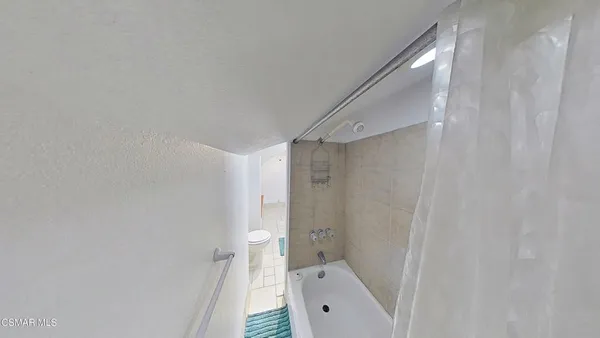 a view of a back yard of the house