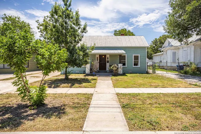 a view of swimming pool with outdoor seating