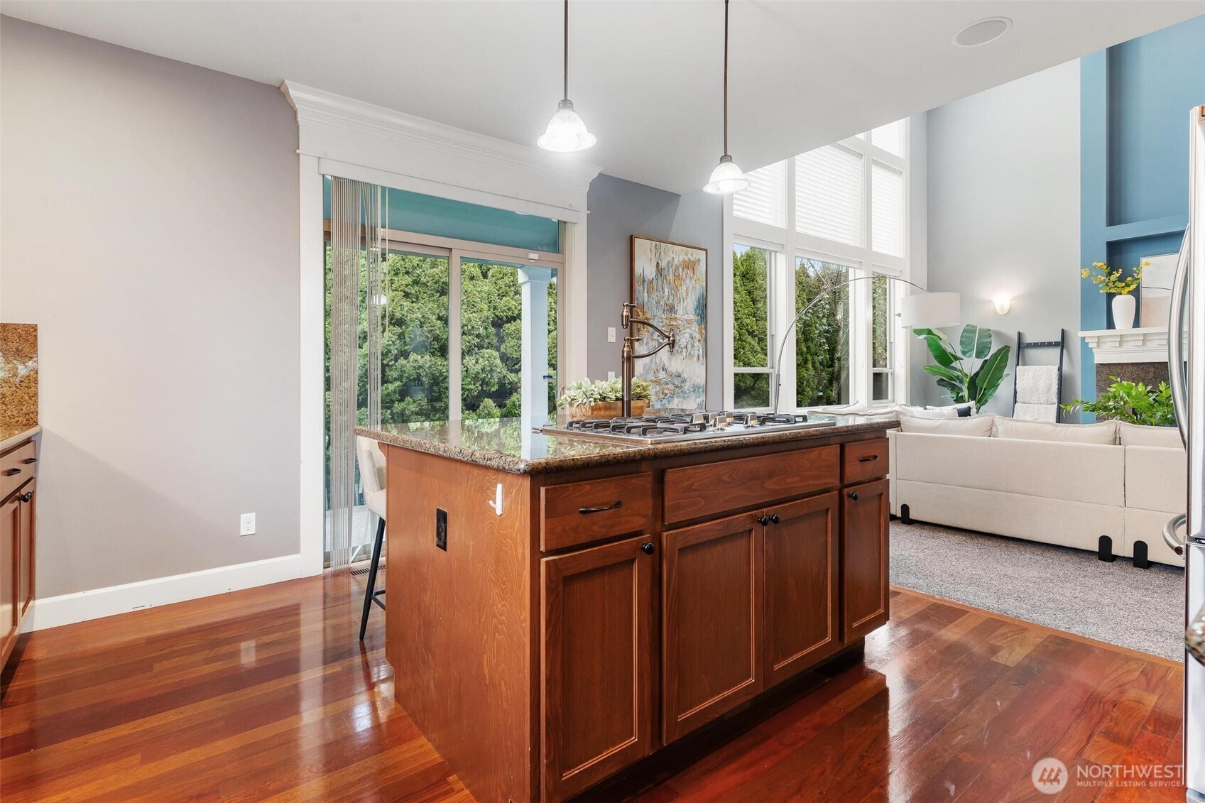 6743 Southeast 2nd Street Renton, WA 98059 - Photo 14 of 35 a room with large window and wooden floor