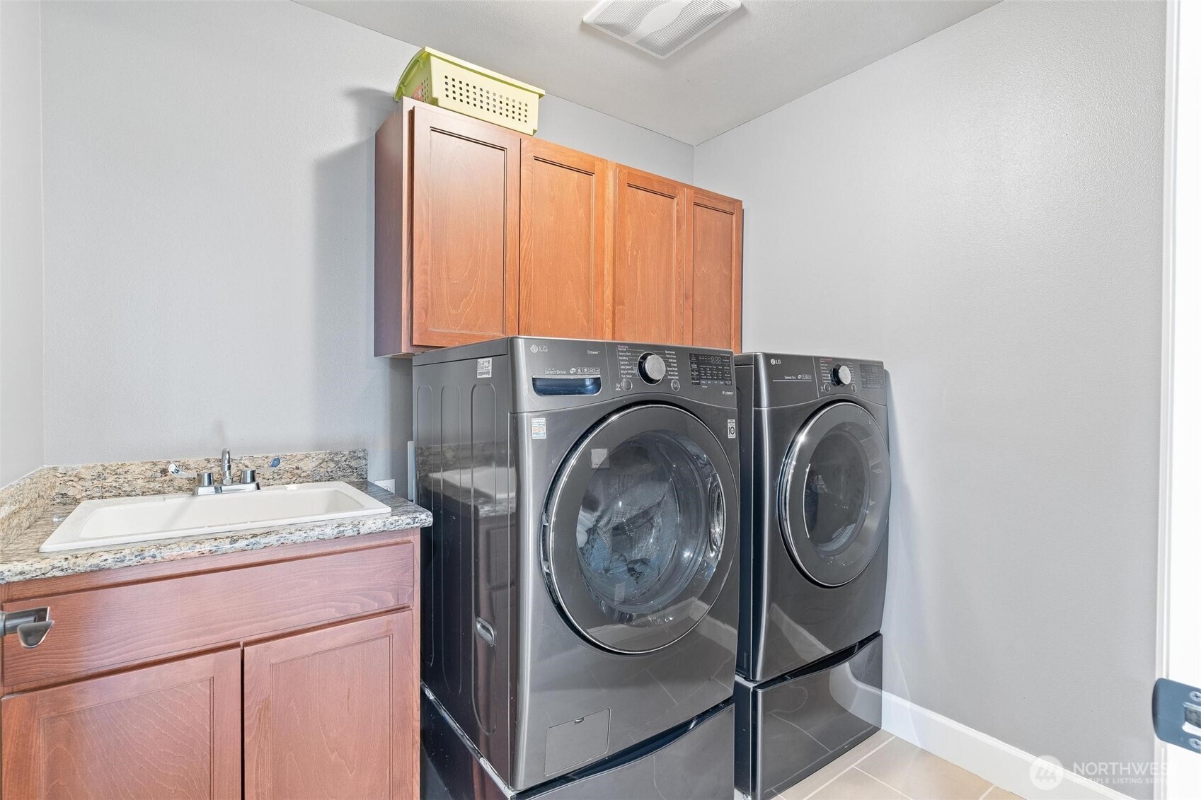 6743 Southeast 2nd Street Renton, WA 98059 - Photo 31 of 35 a utility room with sink dryer and washer