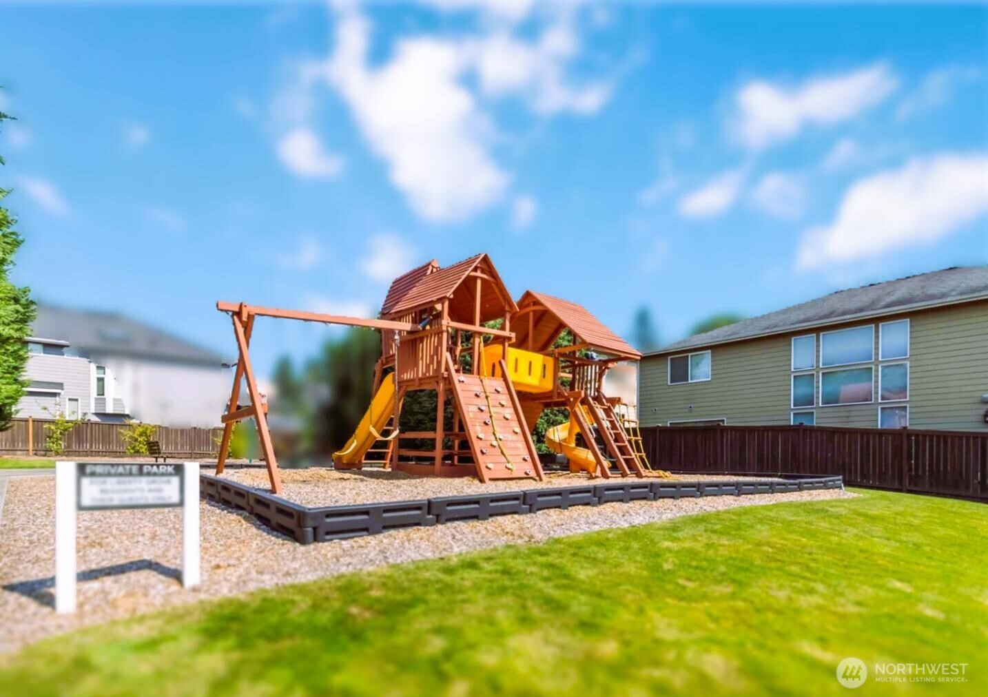6743 Southeast 2nd Street Renton, WA 98059 - Photo 34 of 35 a view of a backyard with a slide and a table