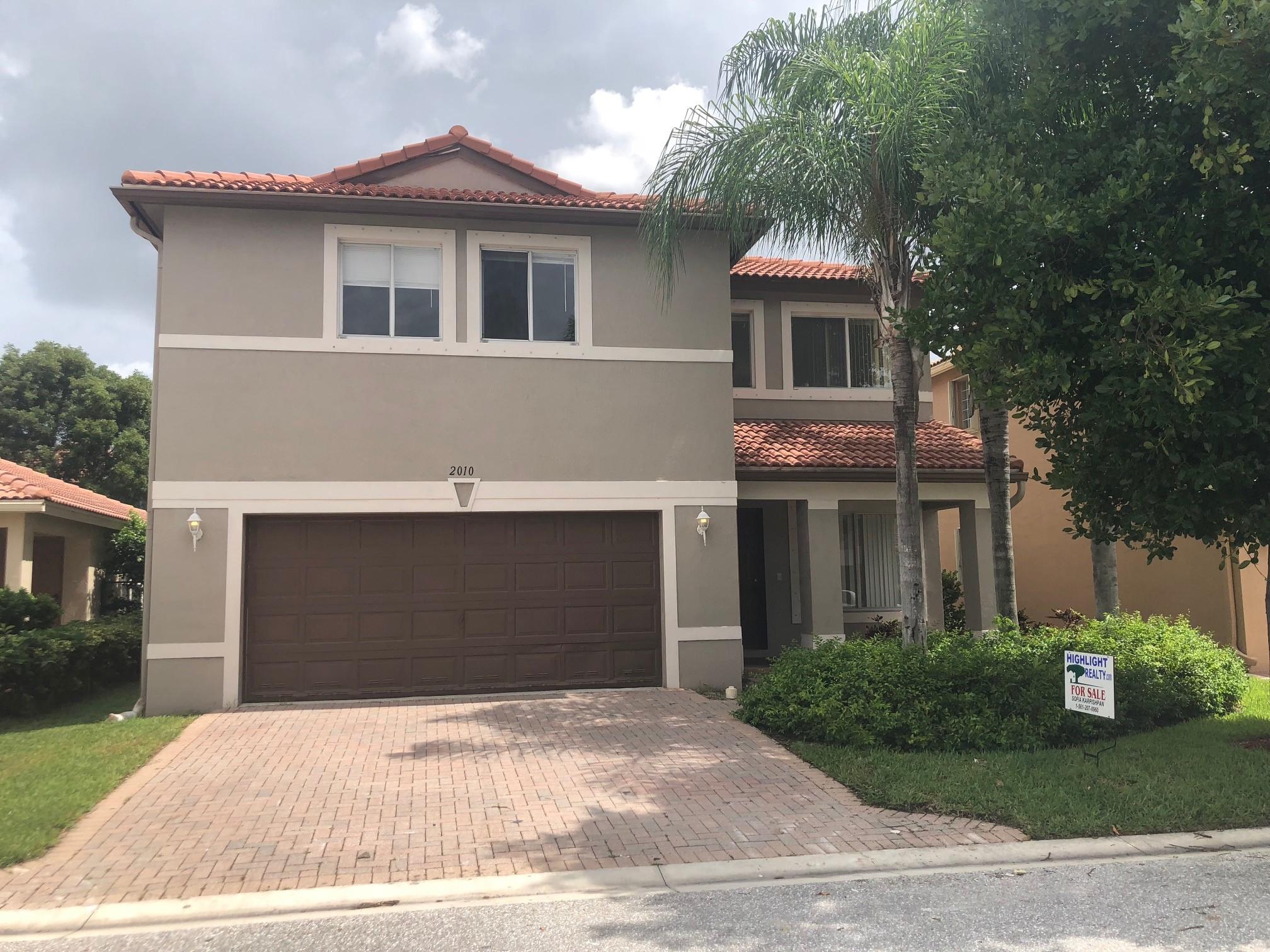 2010 Little Torch Street Riviera Beach, FL 33407 - Photo 1 of 32 Exterior front