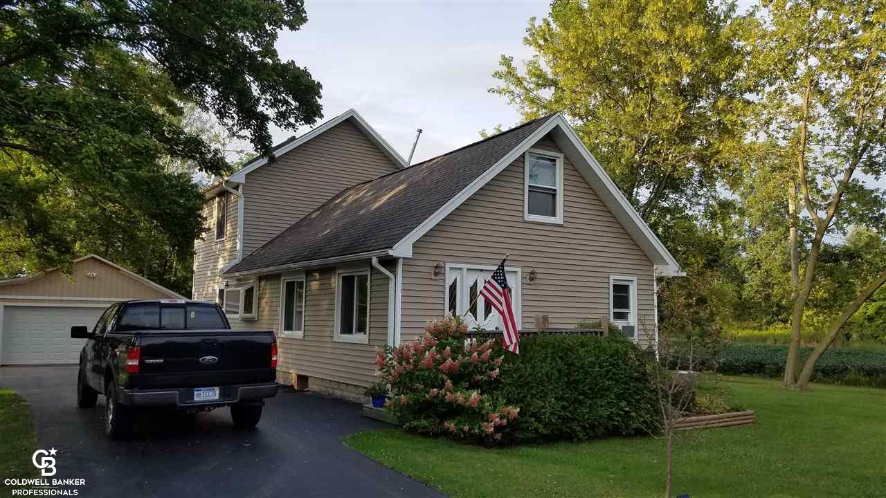 7630 Lapeer Road Avoca, MI 48006 - Photo 1 of 24 This is a view of the front of the home.