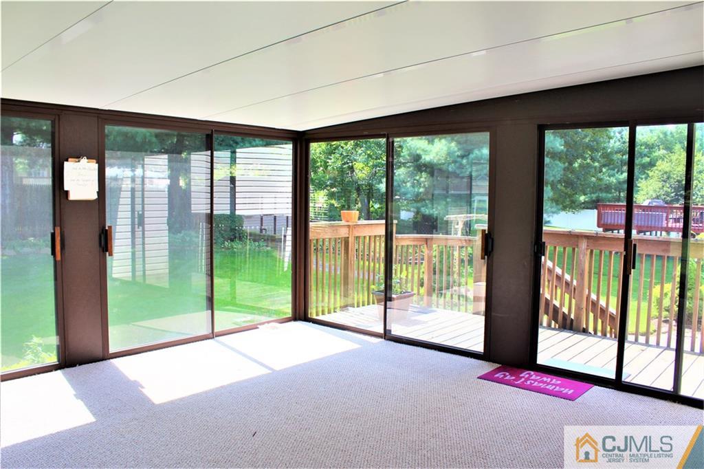 205 Normandy Road Edison, NJ 08820 - Photo 12 of 25 a view of a room with window and an outdoor view