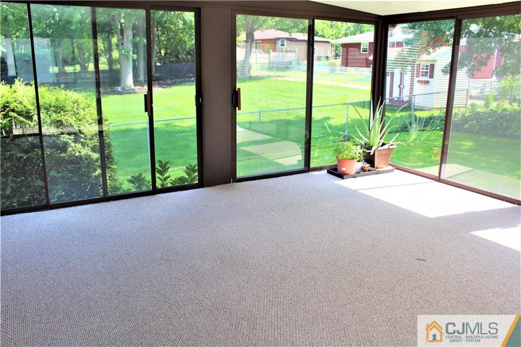 205 Normandy Road Edison, NJ 08820 - Photo 13 of 25 a view of a garden with an outdoor seating