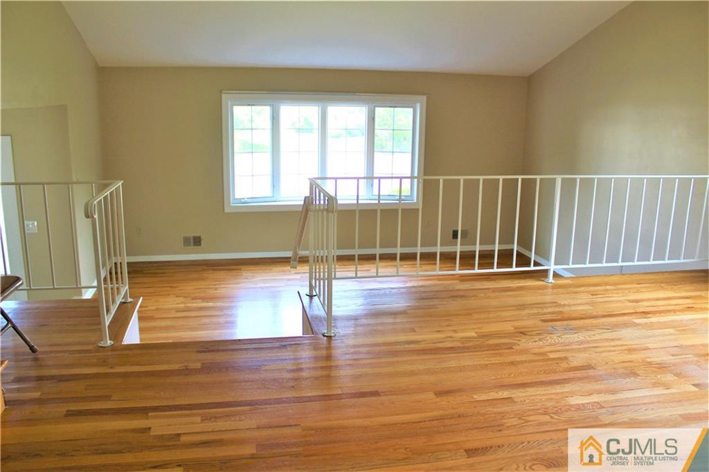 205 Normandy Road Edison, NJ 08820 - Photo 5 of 25 a view of a room with wooden floor