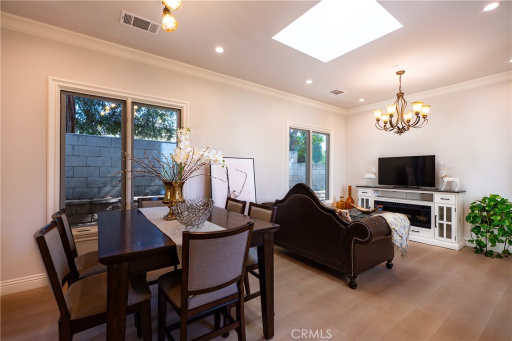 894 Fallen Leaf Road Arcadia, CA 91006 - Photo 21 of 28 a living room with furniture a flat screen tv and a large window