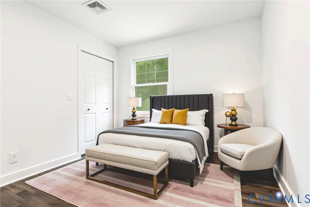 4 West Jerald Street Highland Springs, VA 23075 - Photo 10 of 19 a bedroom with a bed and a night stand