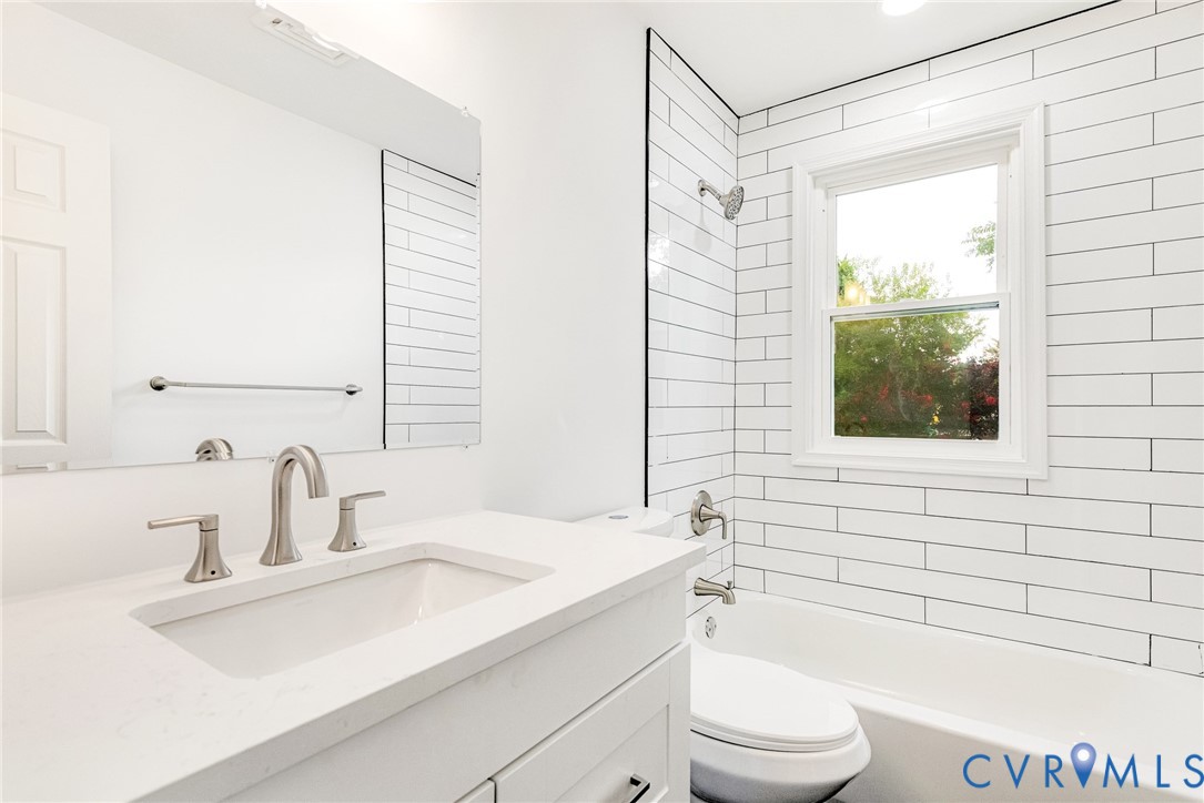 4 West Jerald Street Highland Springs, VA 23075 - Photo 12 of 19 a bathroom with a sink a toilet and shower