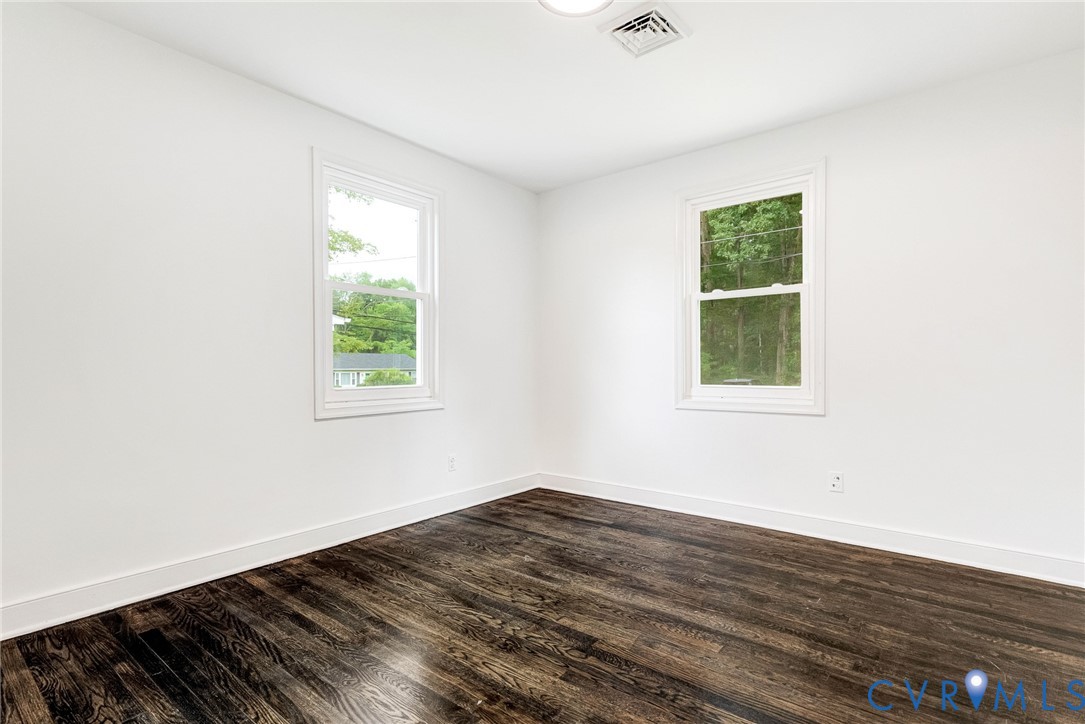 4 West Jerald Street Highland Springs, VA 23075 - Photo 15 of 19 an empty room with wooden floor and windows