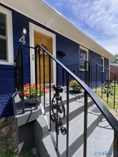 4 West Jerald Street Highland Springs, VA 23075 - Photo 3 of 19 a living room with wooden floor stairs and furniture