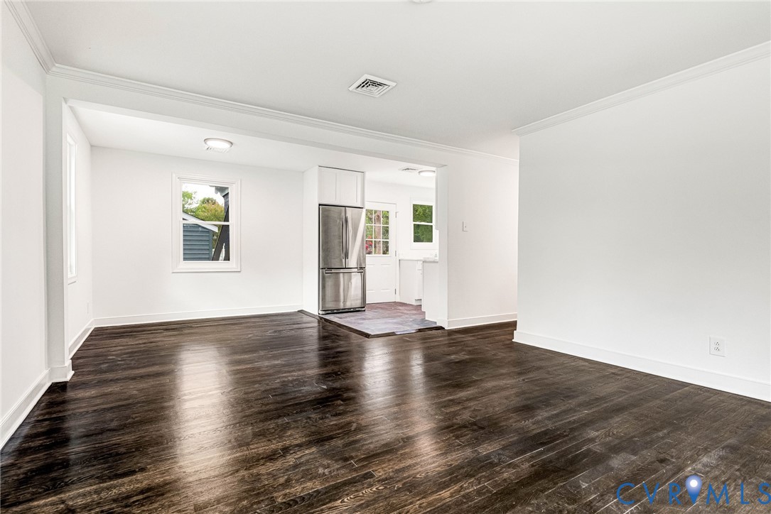 4 West Jerald Street Highland Springs, VA 23075 - Photo 7 of 19 an empty room with wooden floor and windows