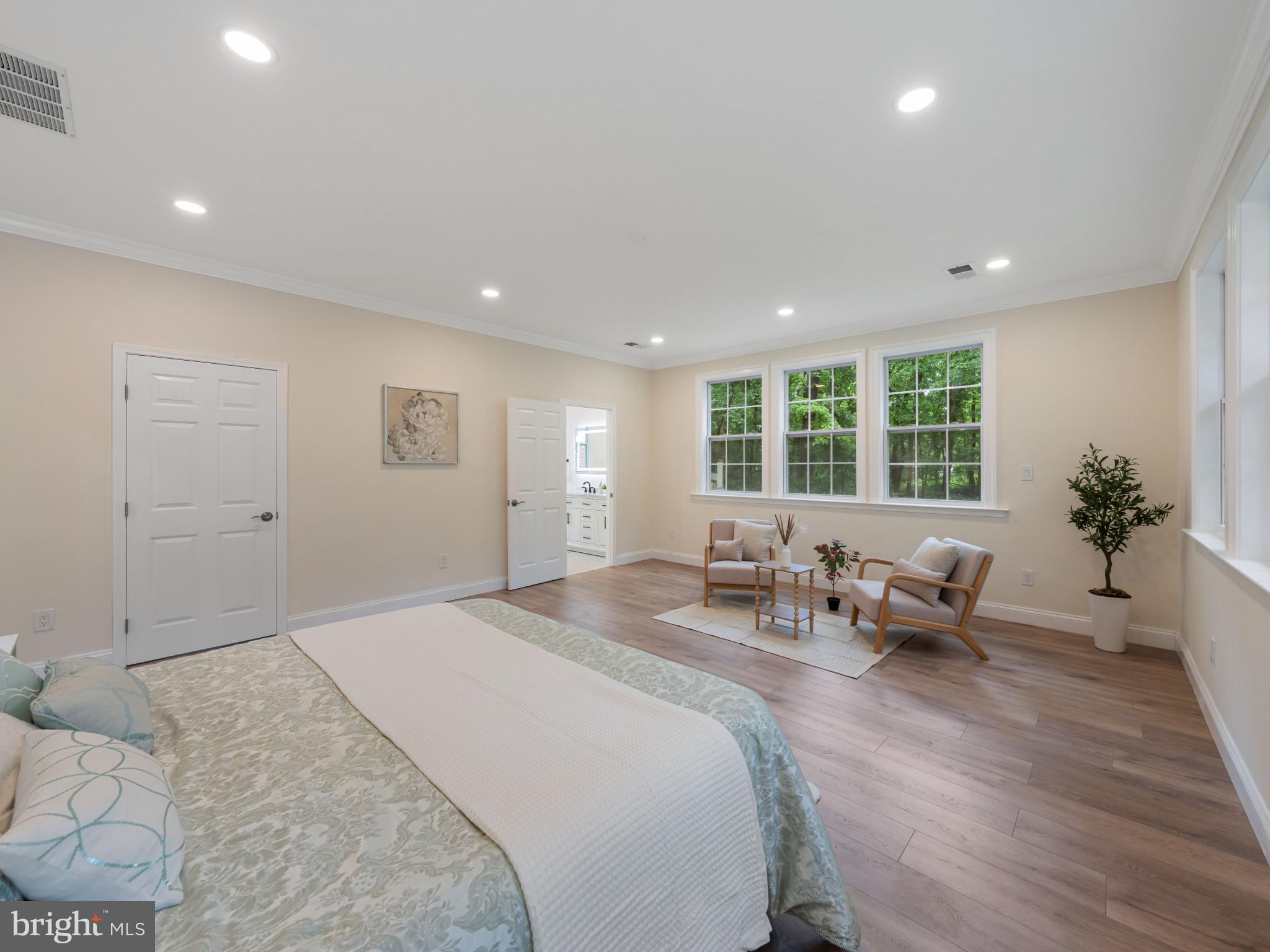 5503 Blacksburg Road Springfield, VA 22151 - Photo 20 of 30 a bedroom with furniture and a large window