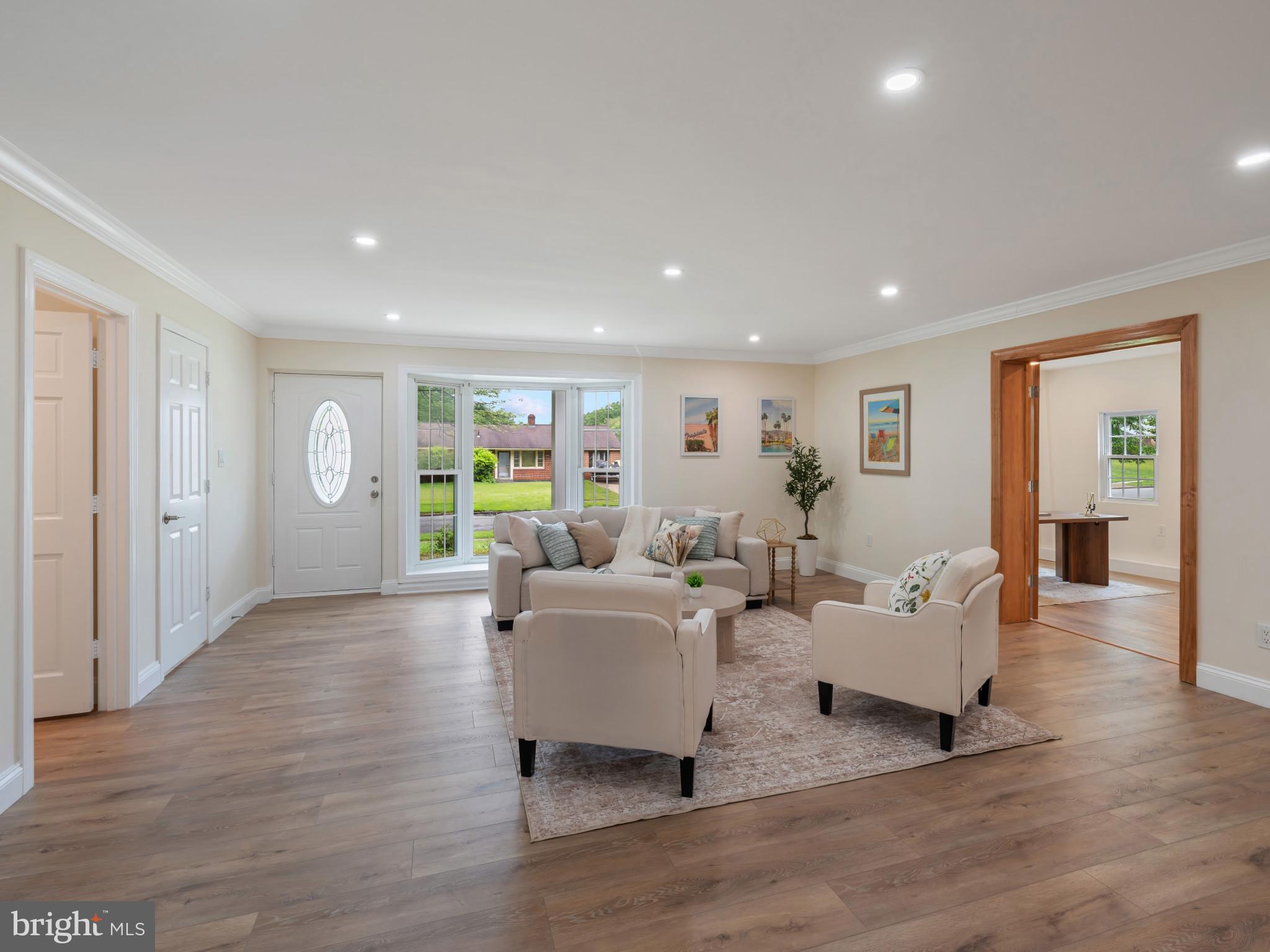 5503 Blacksburg Road Springfield, VA 22151 - Photo 2 of 30 a living room with furniture and wooden floor