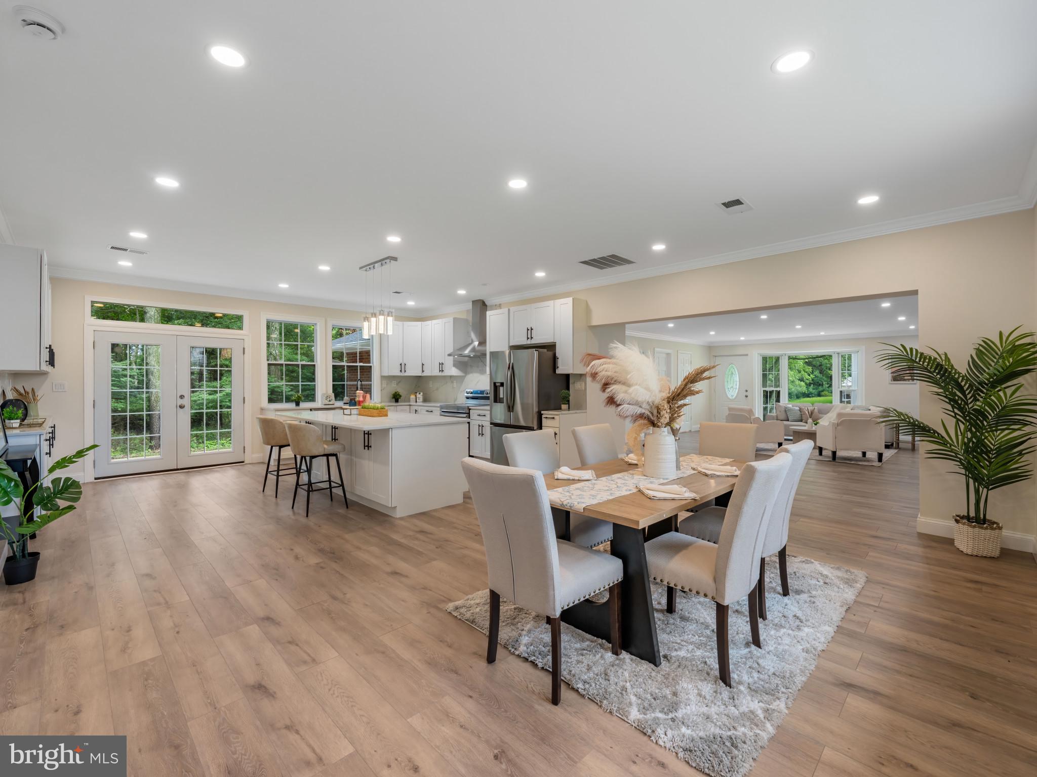 5503 Blacksburg Road Springfield, VA 22151 - Photo 10 of 30 a view of a dining room with furniture and wooden floor