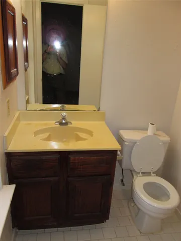 a bathroom with a sink and a toilet