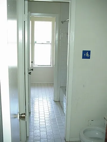 a bathroom with a toilet