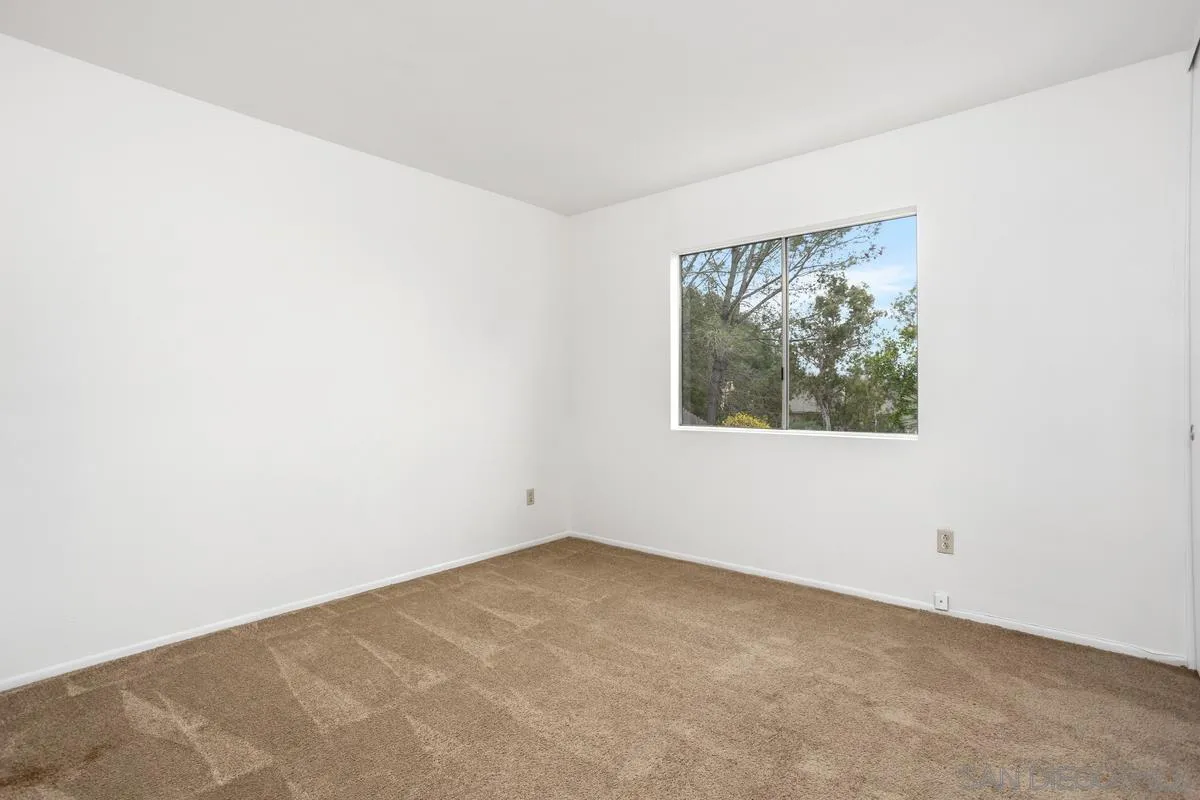 4617 Sheridan Road Oceanside, CA 92056 - Photo 17 of 39 an empty room with a window