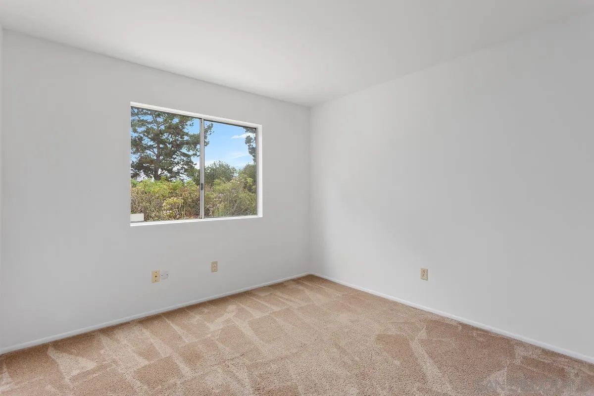 4617 Sheridan Road Oceanside, CA 92056 - Photo 22 of 39 an empty room with windows